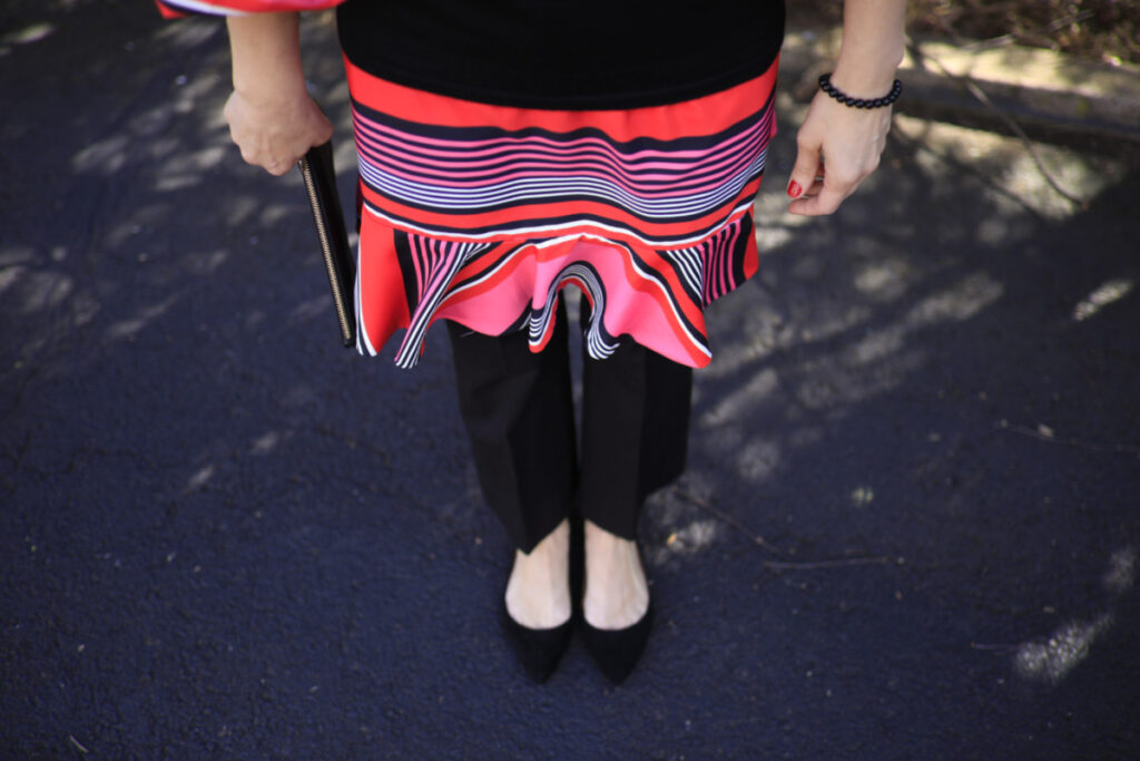 Pink and Black Stripe Dress Standing Out in a Crowd
