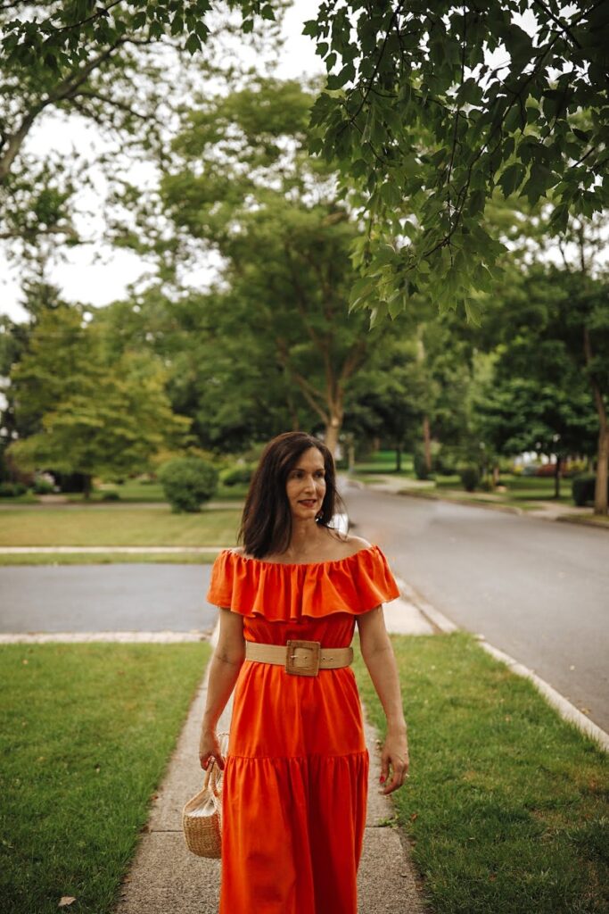 Want to take your clothes from meh to marvelous? Read today's post about how I took this boring beige dress and made this awesome bright orange boho dress!