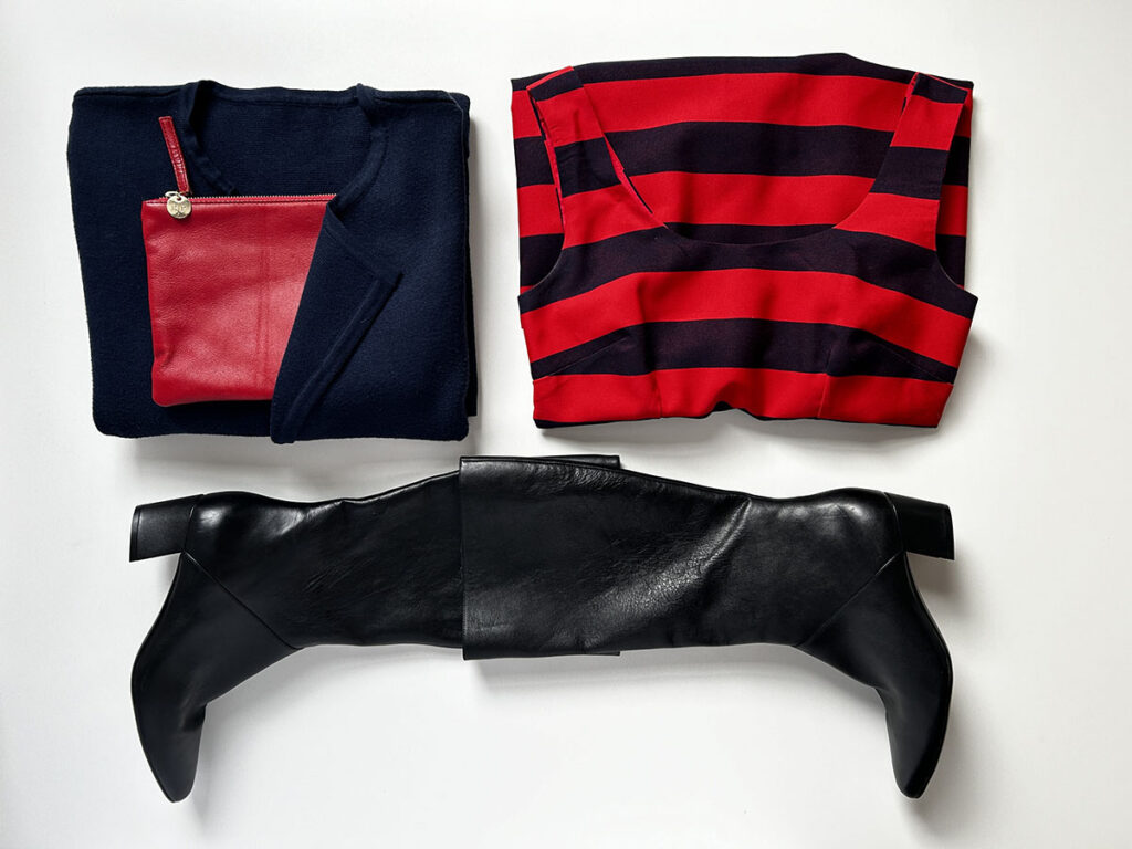 Navy & red striped dress navy sweater coat Black tall boots and red Roxbury clutch