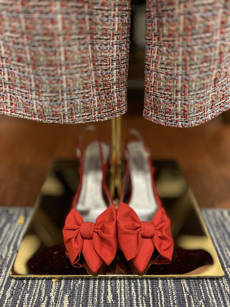 Handmade Red Tweed pants styled for winter with seasonal accessories